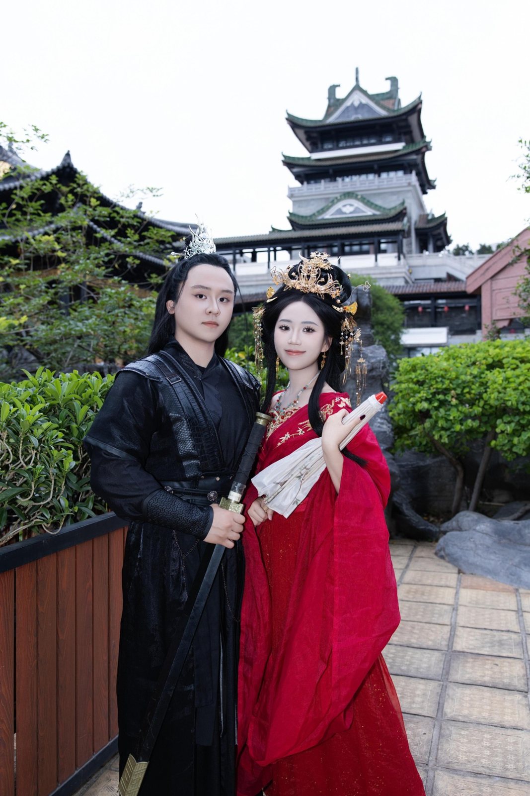The couple in the garden, Cinderella holding a folded parasol